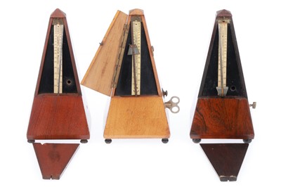 Lot 529 - Collection of 3 Metronomes
