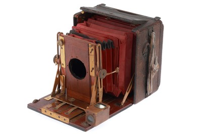 Lot 402 - A Quarter Plate Folding Mahogany Camera
