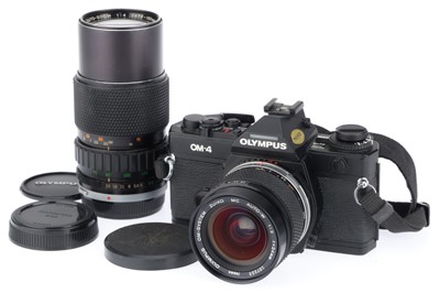 Lot 217 - An Olympus OM-4 SLR Camera Outfit