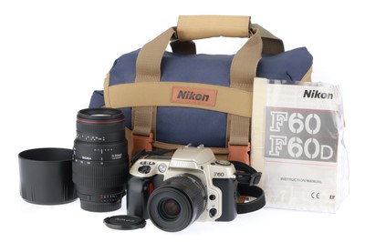 Lot 31 - A Nikon F60 SLR Camera Outfit