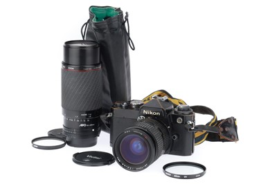 Lot 19 - A Nikon FE 35mm SLR Camera Outfit