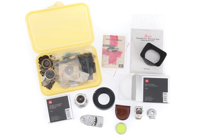 Lot 28 - A Leitz Wetzlar f/3.5 5cm Lens and Leica Accessories