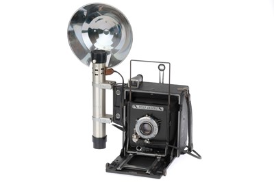 Lot 335 - A Graflex Speed Graphic Folding Press Camera and Flash