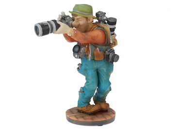 Lot 797 - A Porcelain Statue of a Photographer
