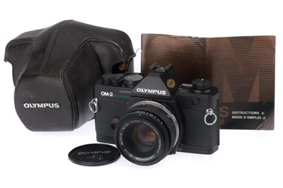 Lot 236 - An Olympus OM-2 Spot/Program 35mm SLR Camera