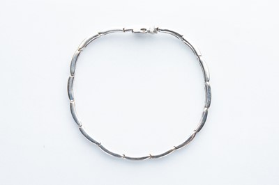 Lot 15 - A 9ct Yellow Gold Rhodium Plated Diamond Line Braclet
