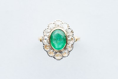 Lot 31 - A 18ct Yellow Gold Emerald & Diamond Ring
