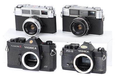 Lot 129 - A Group of Yashica 35mm SLR Cameras