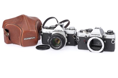 Lot 106 - A Group of Olympus 35mm SLR Cameras