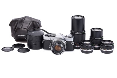 Lot 319 - An Olympus M-1 SLR Camera Outfit