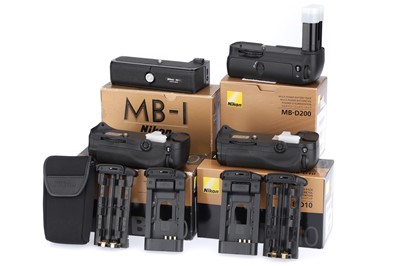 Lot 316 - A Group of Nikon Battery Pack Accessories