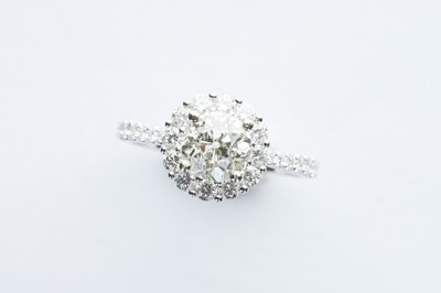 Lot 68 - A 18ct White Gold Diamond Halo Ring