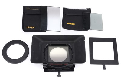 Lot 312 - A Van Diemen Filter Hood and Filters