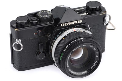 Lot 256 - An Olympus OM-1N 35mm SLR Camera