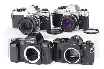 Lot 174 - A Group of Nikon and Canon Cameras