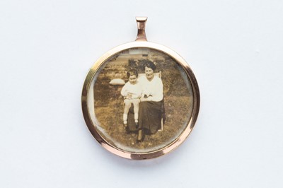 Lot 94 - A Gold Convex Glass Bezel Locket