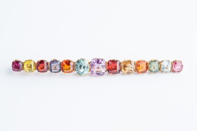 Lot 114 - A Mixed Sample Stone Gold Bar Brooch