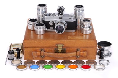 Lot 174 - An OPL Foca Universal R 35mm Rangefinder Camera Outfit