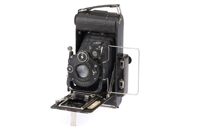 Lot 304 - A Houghton Butcher Folding Bed Camera