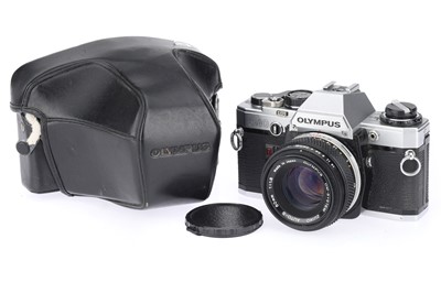Lot 320 - An Olympus OM10 35mm SLR Camera
