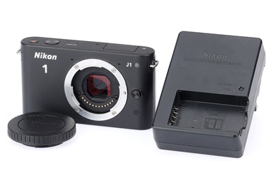 Lot 305 - A Nikon 1 J1 Digital Compact Camera Body