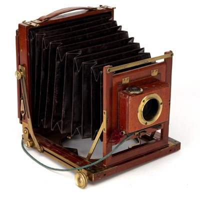 Lot 334 - A London & Paris Optical & Clock Co. New Barroness Half Plate Mahogany Field Camera