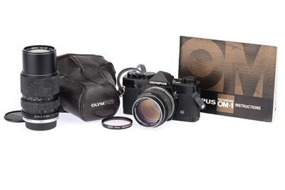 Lot 208 - An Olympus OM1N 35mm SLR Camera Outfit