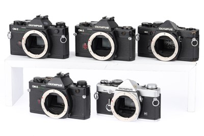 Lot 97 - A Group of Olympus 35mm SLR Cameras
