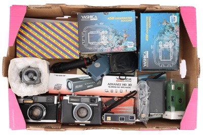 Lot 409 - A Large Selection of Yashica Cameras & Accessories