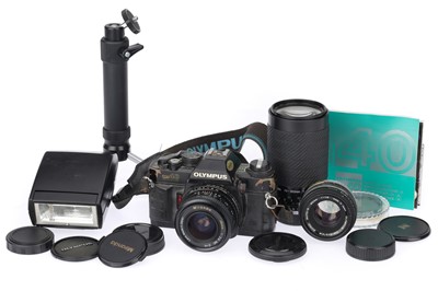 Lot 203 - An Olympus OM40 35mm SLR Camera Outfit