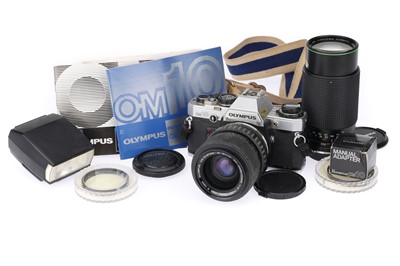 Lot 204 - An Olympus OM10 35mm SLR Camera Outfit