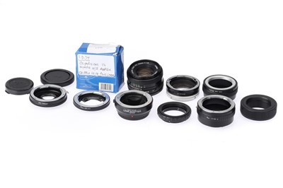 Lot 343 - A Canon FD f/1.8 50mm Lens and Mixed Adaptors
