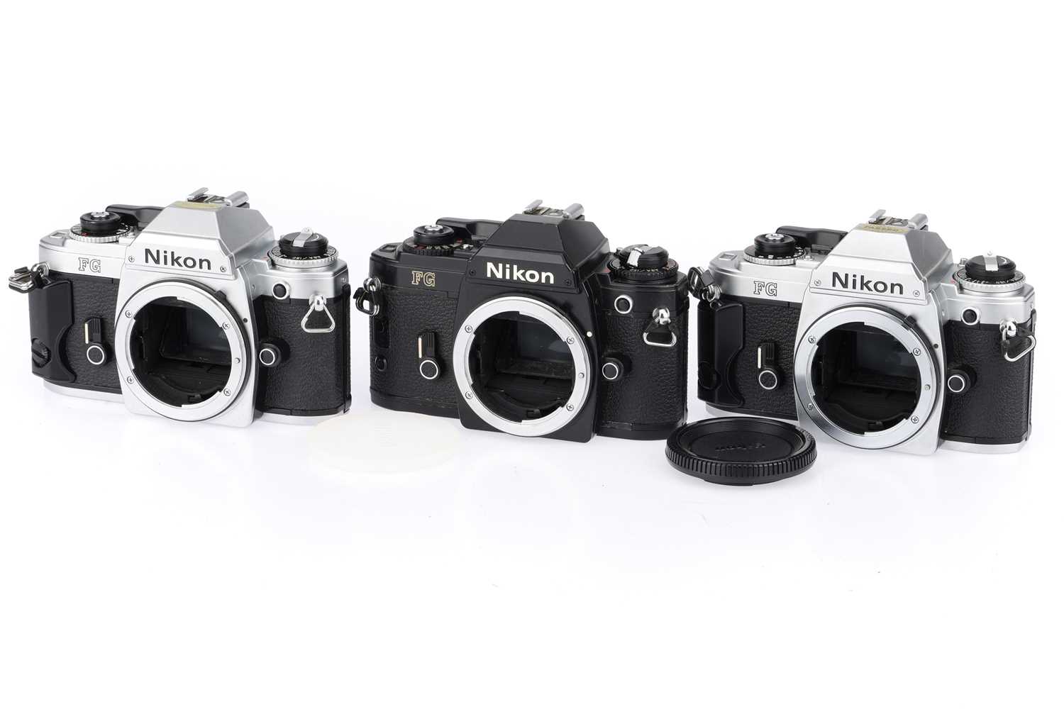 Lot 12 - Three Nikon FG 35mm SLR Cameras