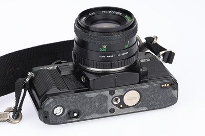 Lot 30 - A Minolta X-700 35mm SLR Camera