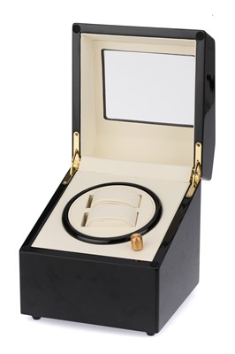 Lot 385 - An Electric Watch Winder