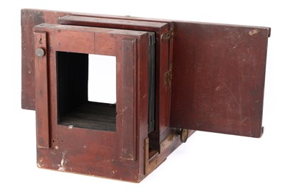 Lot 303 - An Unsigned Mahohany and Brass Camera Body