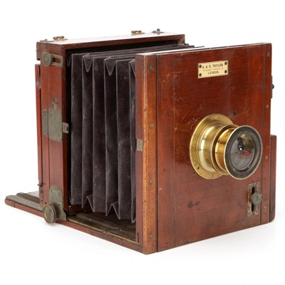 Lot 350 - An A & G Taylor Half Plate Mahogany Tailboard Camera