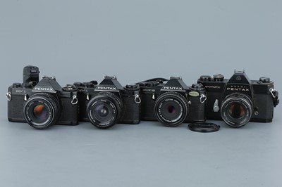 Lot 316 - Four Black Paint Pentax SLR Cameras
