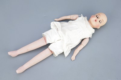 Lot 104 - An Unmarked Bisque Doll
