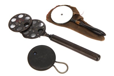 Lot 127 - A Large Loring Type Ophthalmoscope, Opticians Colour Tester & Simple Ophthalmoscope / Retinoscope