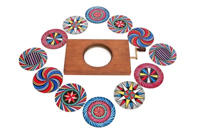 Lot 258 - An Interchangeable Hand-Painted Chromotrope Magic Lantern Slide Set